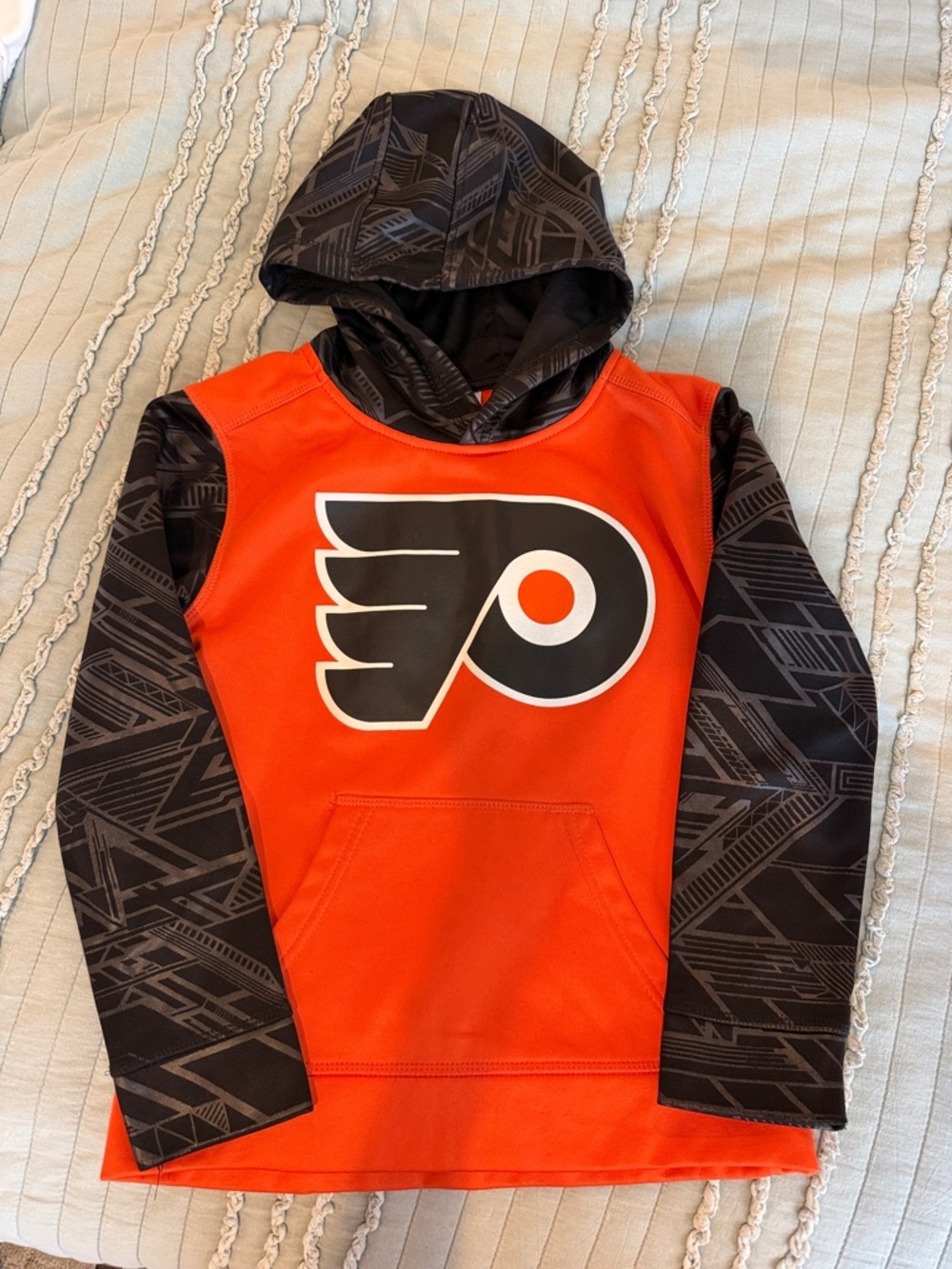 NHL Boys Orange Pullover Hoodie with Black Patterned Sleeves